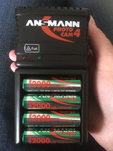 Brand New Battery charger with 4 AA rechargeable 2000mAh batteries