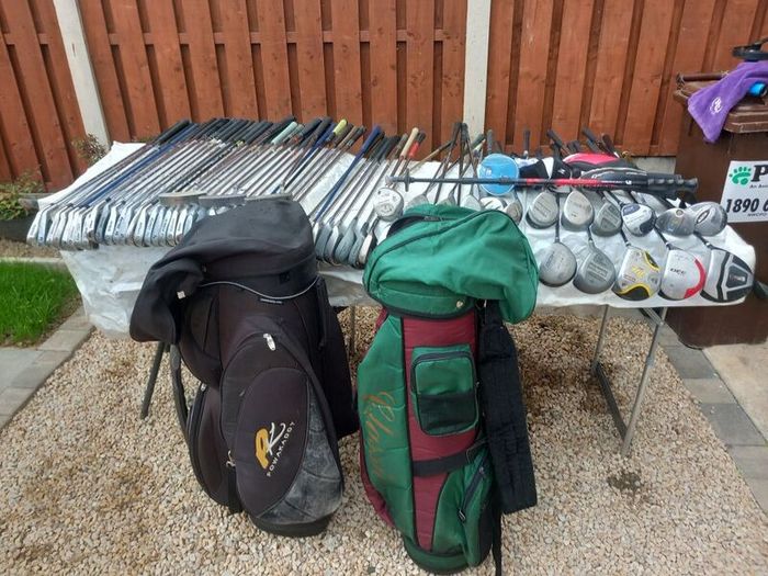 A selection of golf clubs and bags. NOT SELLING SEPARATE