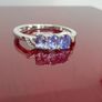 Silver Tanzanite Trilogy Ring in Platinum Overlay Sterling Silver. Image 4