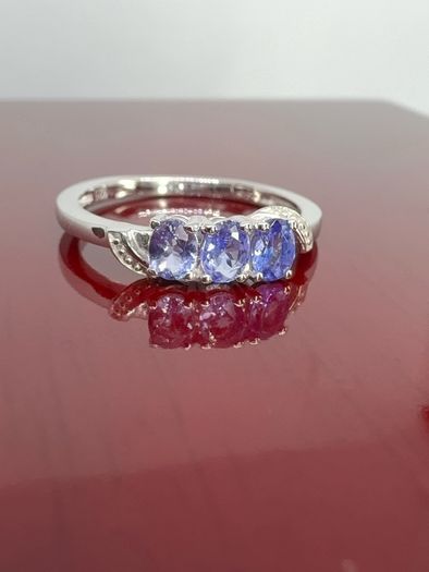 Silver Tanzanite Trilogy Ring in Platinum Overlay Sterling Silver.