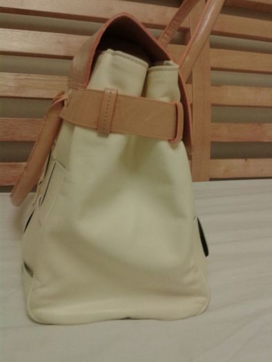 cream woman hand bag