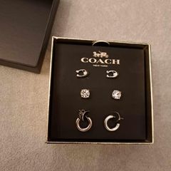 Coach stud earings