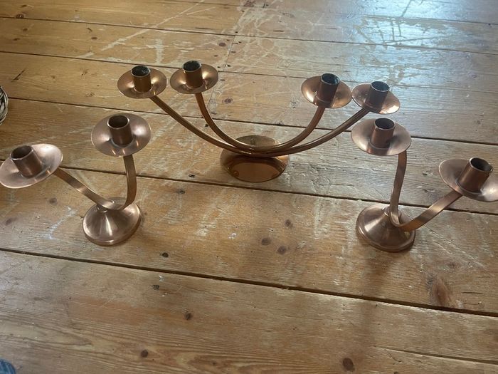Collection of brass and copper candle holders