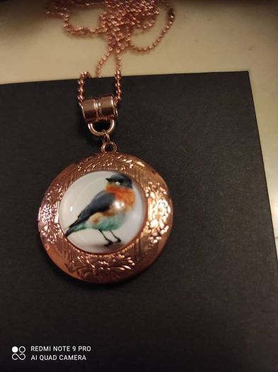 Handmade rosegold robin locket