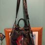 shoulder bag is from the brand Desigual. Image 4