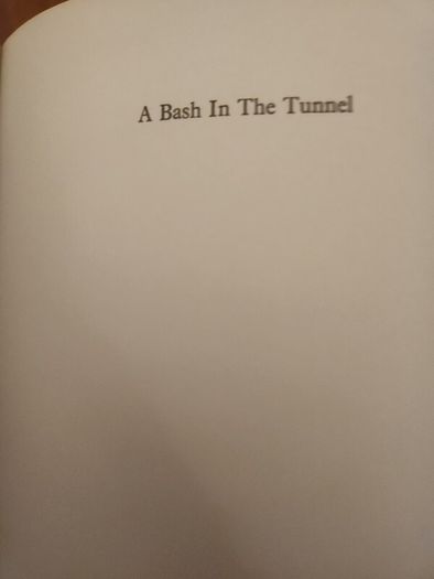 A Bash In The Tunnel. Edited By John Ryan. First Edition Hardback With Dustjacket In Good Condition.