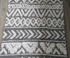 Kukoon grey tufted rug