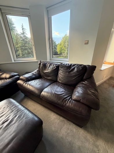 free leather couches and pouffe