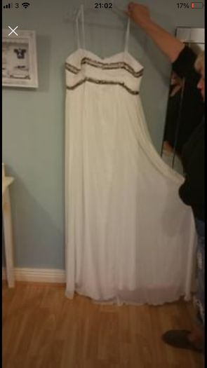 Brand new with tag designer handmade wedding dress by Dresscode. Grecian style with embellishments
