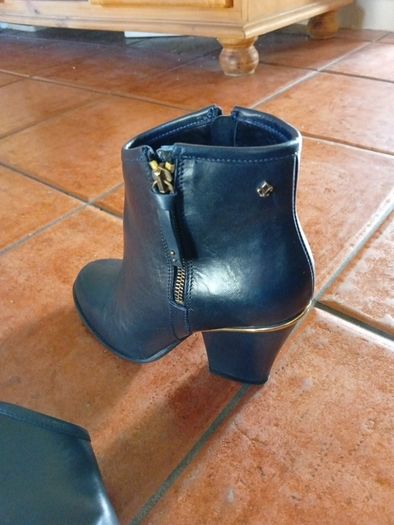 Amy Huberman navy boots