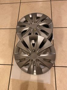 Set of 4 hubcaps in excellent condition
