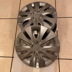 Set of 4 hubcaps in excellent condition