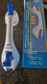 Suction grab handle