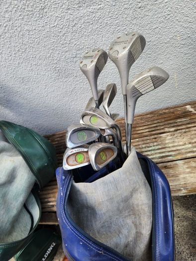 five golf bags and sixty nine clubs . ONE LOT ONLE.