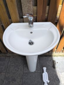 Bathroom sink, tap and pedestal