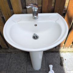 Bathroom sink, tap and pedestal