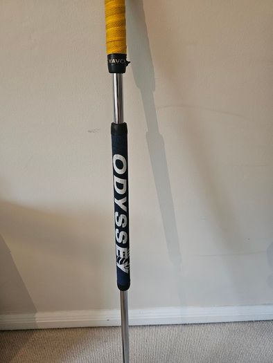 Odyssey broomstick putter.