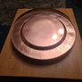 Gold/copper coloured metal plate charges Image 3