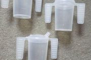 3 Cups with handles. Price is for all 3. Not sold separately.