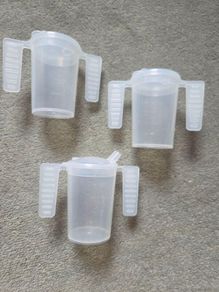 3 Cups with handles. Price is for all 3. Not sold separately.