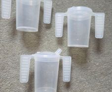 3 Cups with handles. Price is for all 3. Not sold separately.