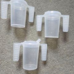 3 Cups with handles. Price is for all 3. Not sold separately.