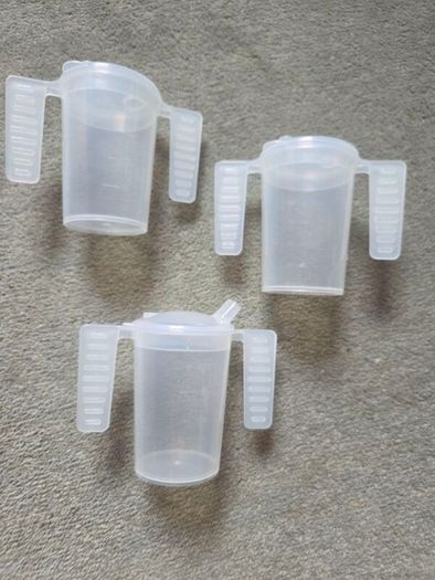 3 Cups with handles. Price is for all 3. Not sold separately.