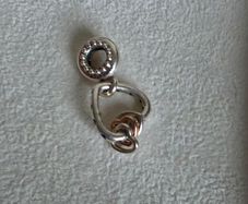 Pandora  heart highlights charm with rose gold middle dangle heart and purple CZ
