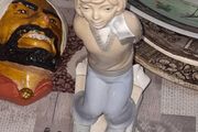 Old Ornament of a Boy in a Winter Hat and Light Colored Clothing on Skis, Made in Spain.