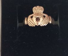 9ct gold claddagh ring with garnet stone  - size P