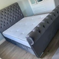 Sleigh bed frame with mattress