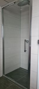 Brand new, sleek, modern shower door