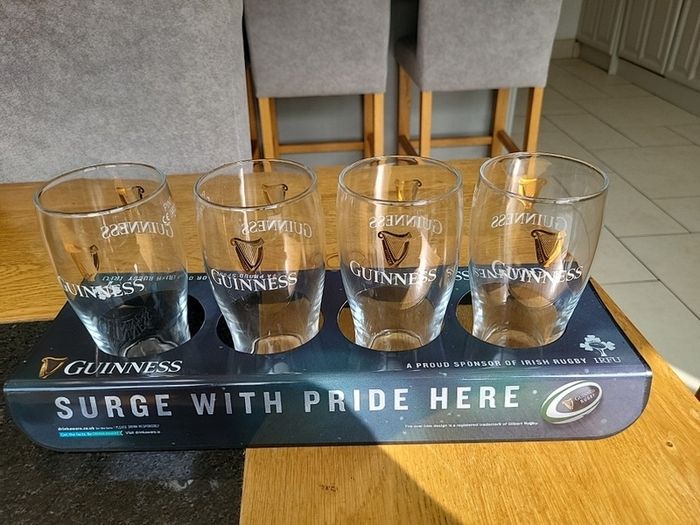 guinness rugby glass holder with 4 pint glasses