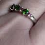 A 925 sterling silver ring with green and pink stones. Image 5