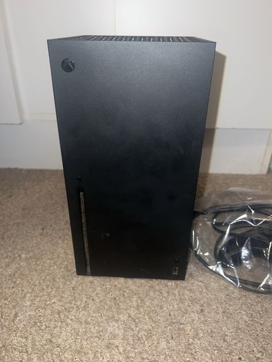 Xbox series x, 2 controllers and rechargeable battery pack& charger stand