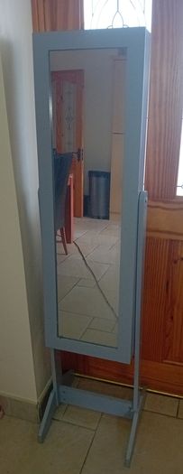 Grey freestanding jewellery cabinet with mirror