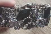 Beautiful flower cuff bracelet with rhinestones butterflies.