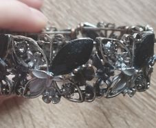 Beautiful flower cuff bracelet with rhinestones butterflies.