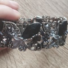 Beautiful flower cuff bracelet with rhinestones butterflies.
