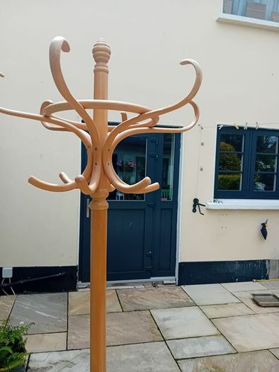 Wooden rotating coat stand