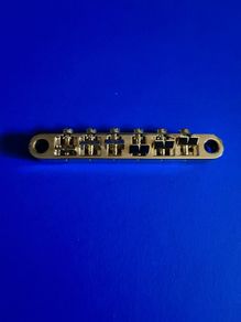 Les paul epiphone bridge gold