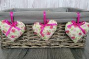 Hanging decorative hearts.