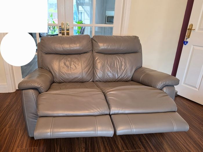 Leather sofas manual reclined in good condition