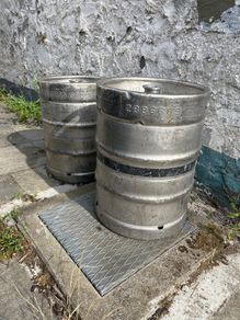 2 Empty Guinness Kegs