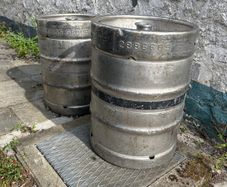 2 Empty Guinness Kegs