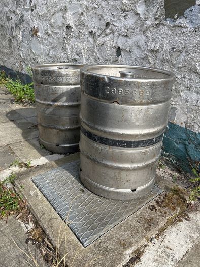 2 Empty Guinness Kegs