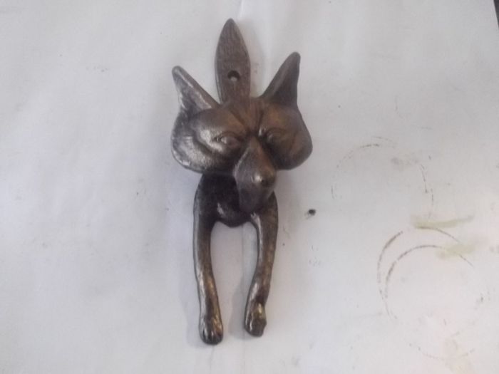 a metal fox door knocker