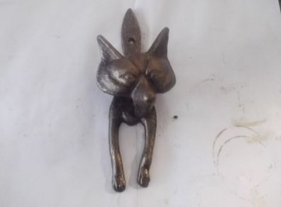 a metal fox door knocker