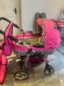 3 in one pink and leopard print pram