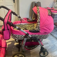 3 in one pink and leopard print pram